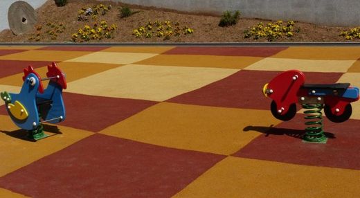 Paviment de cautxú per a parcs infantils i àrees d’esbarjo